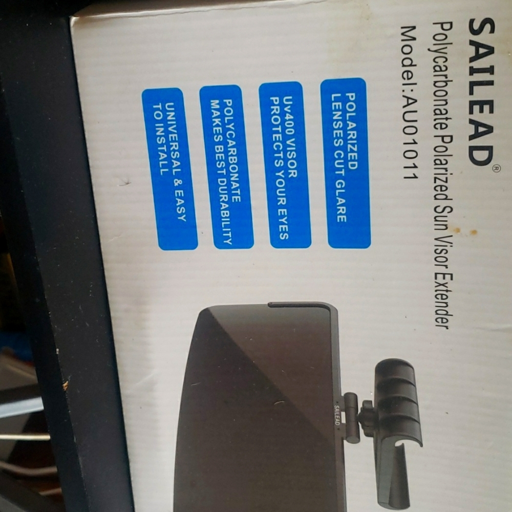 Sailed polycarbonate polarized sun visor extender.